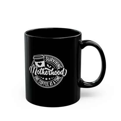 "Surviving Motherhood One Coffee at a Time" Steadfast Black Ceramic Mug