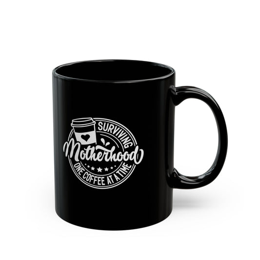 "Surviving Motherhood One Coffee at a Time" Steadfast Black Ceramic Mug