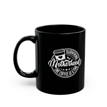 "Surviving Motherhood One Coffee at a Time" Steadfast Black Ceramic Mug